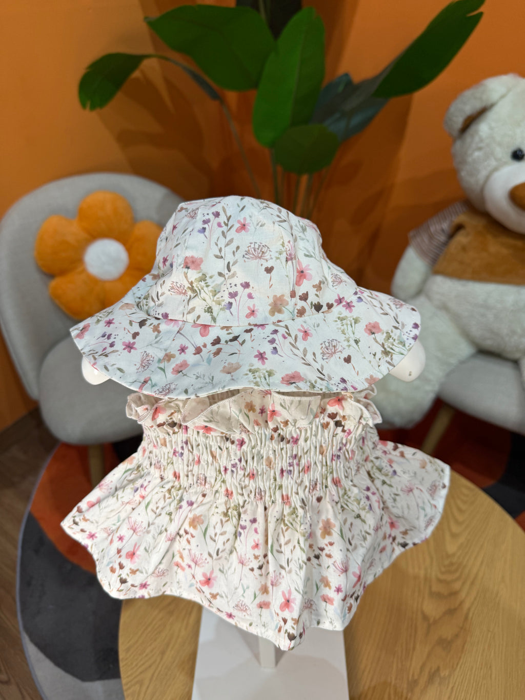 VESTINA A BODY A FIORI CON CAPPELLINO