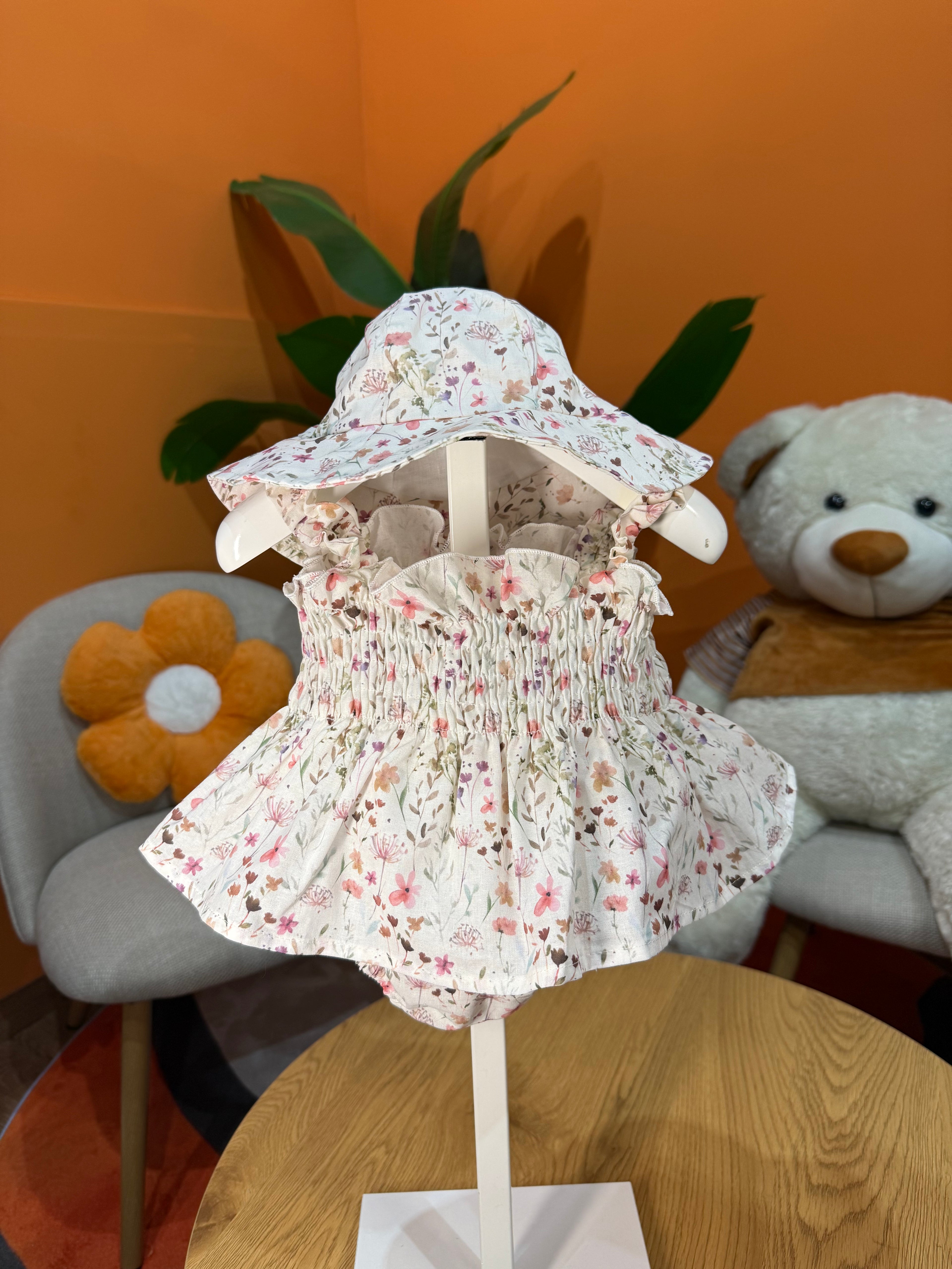VESTINA A BODY A FIORI CON CAPPELLINO